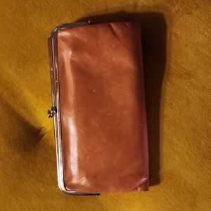 Used Hobo clutch wallet - salmon orange